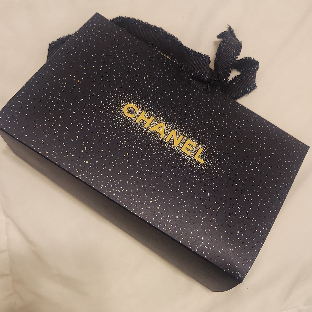 CHANEL Black and Gold Starry Gift Bag